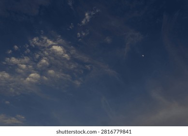 moon with clouds at sunet