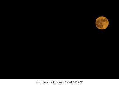 The moon in the corner.