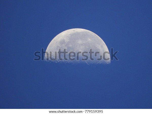 The moon at\
daytime