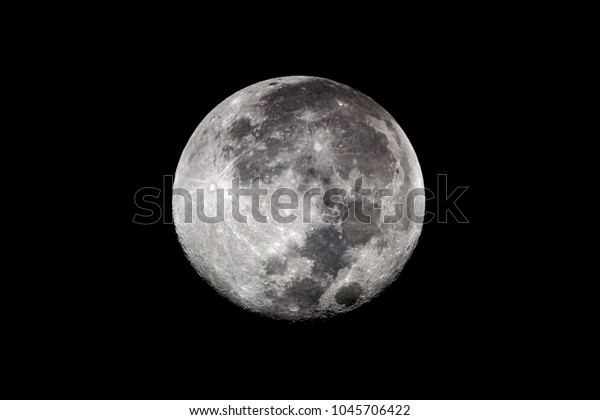 Moon detail / The Moon is an astronomical body
that orbits planet Earth, being Earth's only permanent natural
satellite. It is the fifth-largest natural satellite in the Solar
System, and the largest 