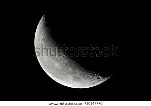 The Moon\
detailed shot taken at 1600mm focal\
length