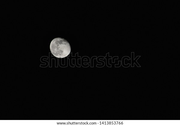 The moon during the\
darkness of the night
