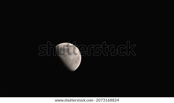 Moon,\
half-lit moon, terminator of the moon, snow-white satellite of the\
earth, moon from afar, dark, black, gloomy\
space