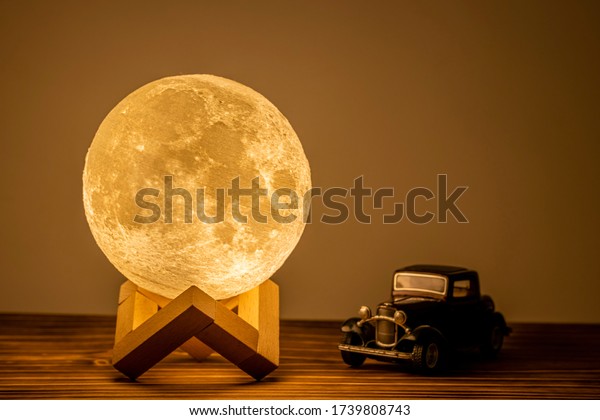 Moon lamp on the\
table