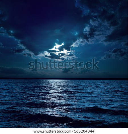 moon light over darken water in night