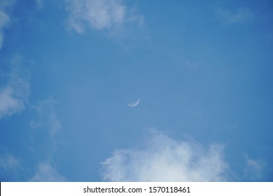 Moon Light In White Clouds, Close Up Of Crescent Moon In The Morning