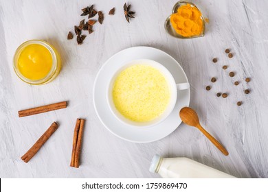 
moon milk with turmeric honey and spices, top view