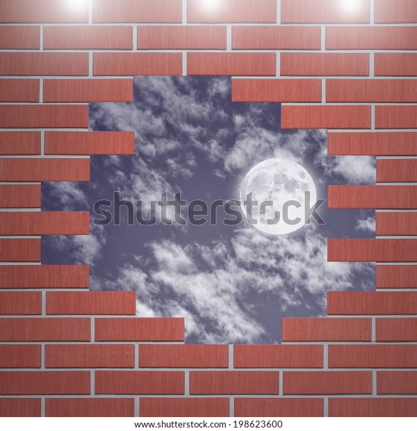 Moon\
in the night sky with hole in the brick wall\
room.