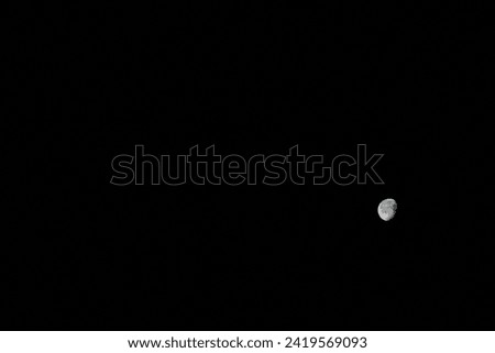 the moon in night sky and Jupiter in Alicante province, Costa Blanca, Spain 