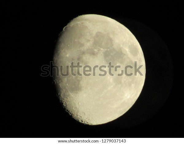 Moon in\
the night sky. Moon on the black\
background