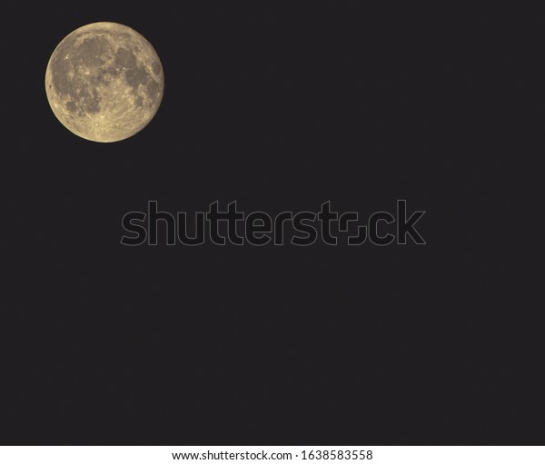 Moon on black ground\
landscape
