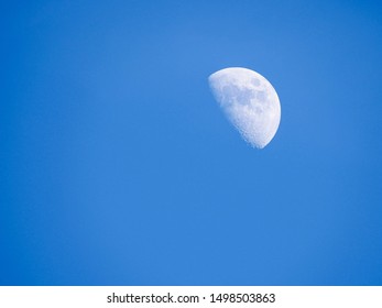 Moon On Blue Sky Day Time, Half Moon At Sky, The Moon In Evening
Blue Sky And Half Moon On Day Time Sky Background.