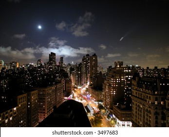 Moon over New York City at nigth. Overlooking Broadway
