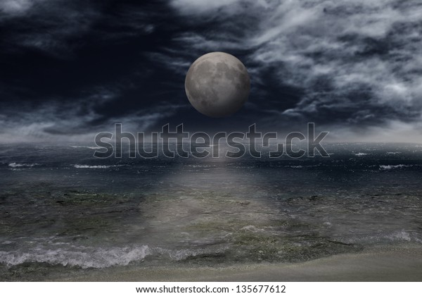 Moon over sea at
night