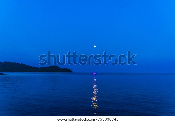 Moon Over sea at
night
