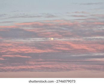 moon peeking through the clouds