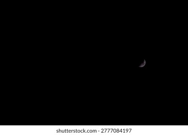 Moon photo; half moon in the sky