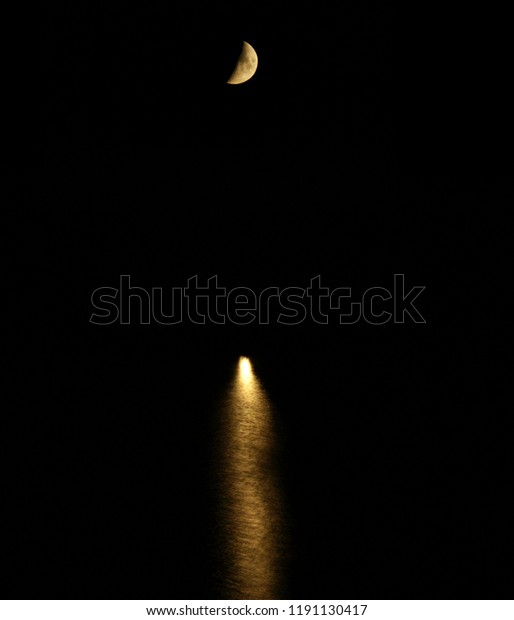                              moon reflection over lake\
at camp  