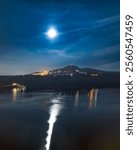 Moon rising over Lake Albano in Castel Gandoldo Italy. 