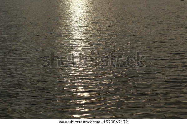 moon\
road on the water, flickering light, water\
surface
