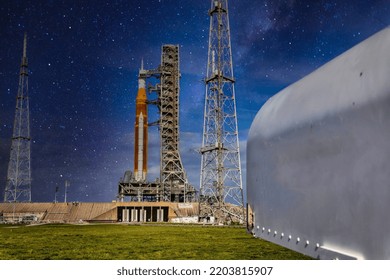 Moon rocket with crew capsule on launch pad in preparation for launch. Primary source, elements of this image furnished by NASA. - Powered by Shutterstock