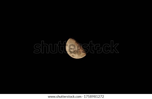
moon seen from the
earth in the dark sky