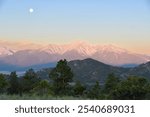 The moon sets behind the Collegiate Range near Buena Vista, Colorado.