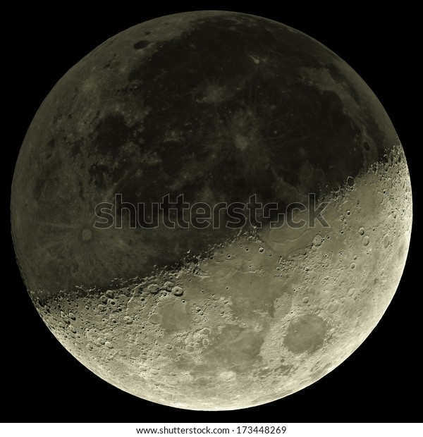 Moon with a shade on a 'darker side'. Sharp
details on the surface.