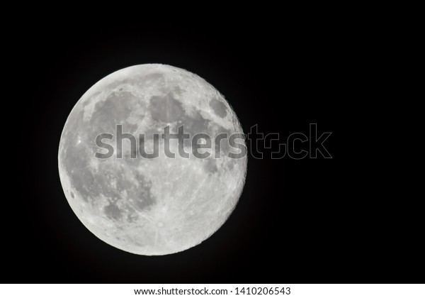 moon in the sky, photo\
as a background