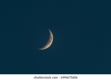 
Moon slice in the dark sky