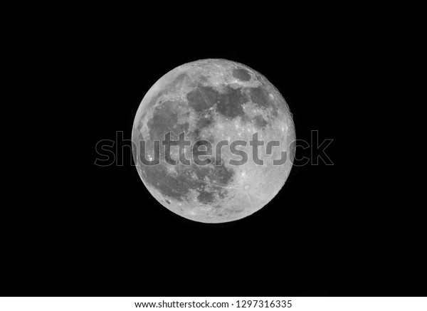 moon in space\
black and white closeup\
photo