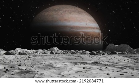 A moon surface and a big planet background