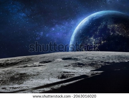 Moon surface and blue Earth planet at night in deep space. Artemis program. Apollo program. Cities lights. Elements of this image furnished by NASA