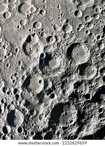 Moon surface. Seamless texture background.
