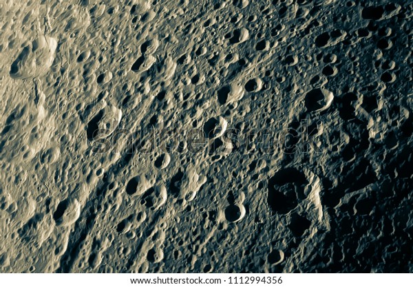 Moon Surface, texture and pattern.\
Image of the Moon showing landing site of Apollo 11 around center\
of the Moon. Elements of this image furnished by\
NASA
