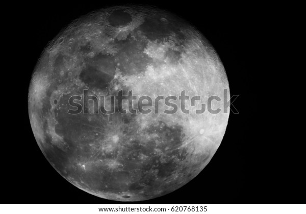 Moon Surface as wallpaper / The Moon is an\
astronomical body that orbits planet Earth, being Earth\'s only\
permanent natural satellite. It is the fifth-largest natural\
satellite in the Solar\
System