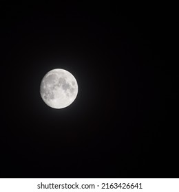 Moon Timelapse, Stock time lapse : Full moon rise in dark nature sky, night time. Full moon disk time lapse with moon light up in night dark black sky. High-quality free video footage or timelapse