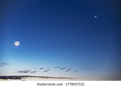  Moon and Venus planet  in the night sky.
