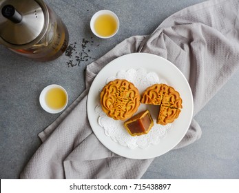 Mooncakes Are Offered  To Friends Or On Family Gathering During The Mid-autumn Festival / Mooncake And Chinese Tea / The Chinese Character On The Mooncake Represent 