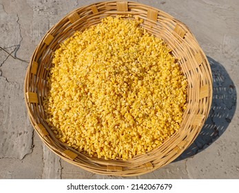 Moong daal or mung dal or green gram or maash. Yellow dry split moong dal beans, moong dal beans in basket. background or texture of mung or moong dal grains or seeds