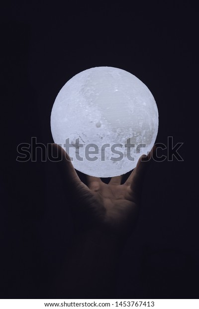 moonlamp in a dark\
room