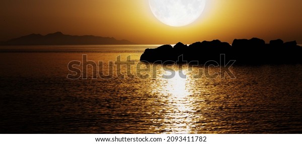 moonlight on the night sea. Elements of this image\
furnished by NASA