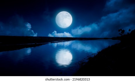 Moonlight Reflection In A River. Night Landscape In River With Full Moon