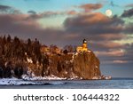 Moonrise and sunset at Split Rock Lighthouse, North Shore of Lake Superior, Minnesota (horizontal)
