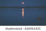 Moonset at lake Chiemsee in Bavaria, Germany