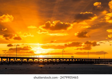 Moonta Bay jetty with people during spectacular sunset, Copper Coast, Northern Yorke Peninsula, South Australia - Powered by Shutterstock