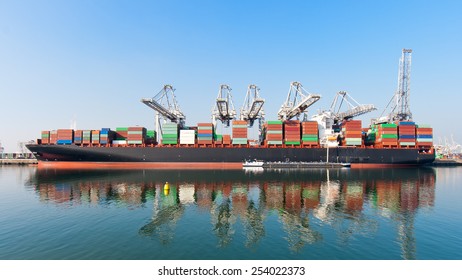 Moored container ship - Powered by Shutterstock