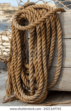a moored rope on a fishing boat taken at Kalkara, Malta