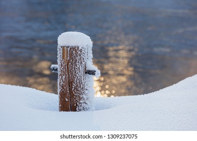 Mooring Bollard Covered With Snow And Hoarfrost On A Cold Winter Day.