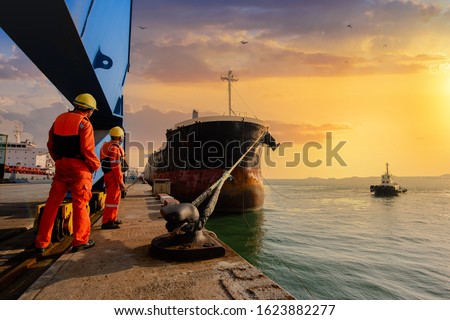 mooring man in charge of safety sailing of the ship leaving from the port